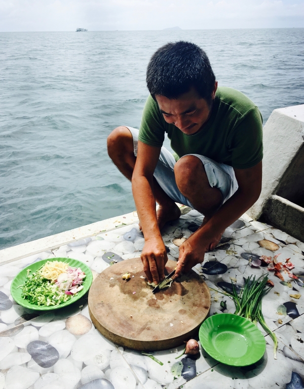 Squatting, Thom Island, Vietnam